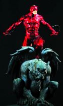 RED DAREDEVIL ON GARGOYLE STATUE